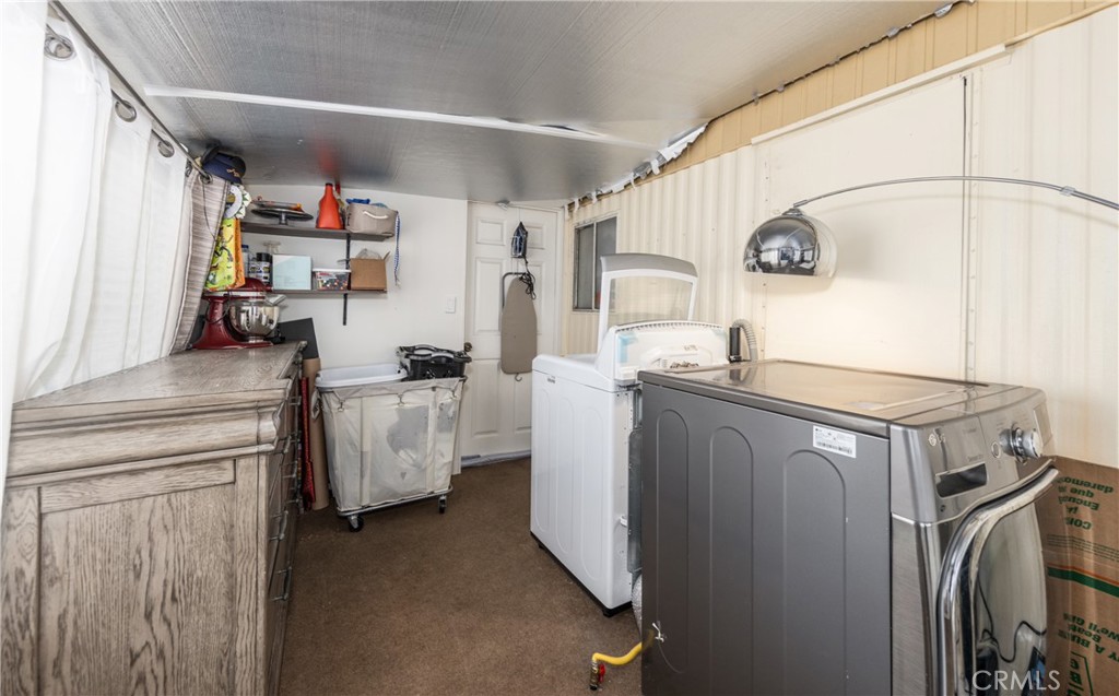 26838 9th Street, Unit F2 Highland, CA 92346 - Photo 13 of 18 a utility room with dryer and washer