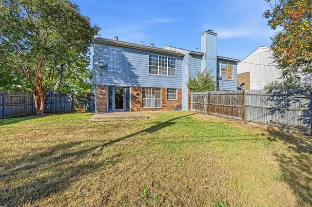 a house view with a garden space
