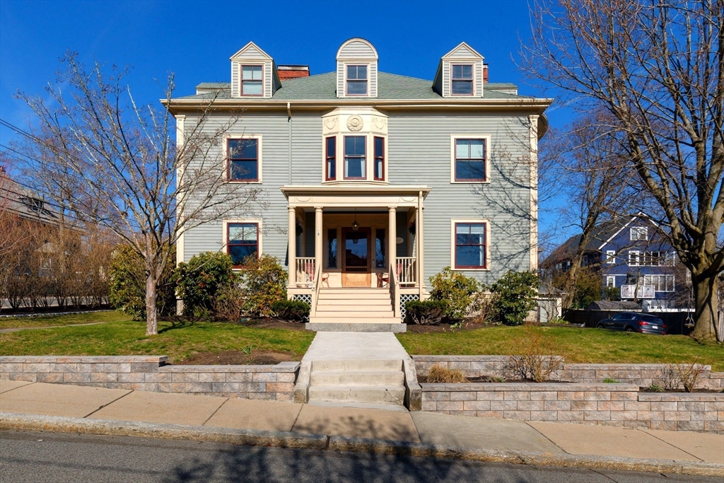 25 Barrington Road Boston, MA 02124 - Photo 1 of 33 a front view of a house with a yard