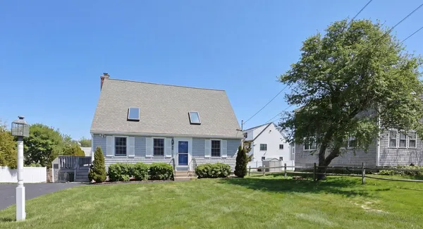 a view of a house with a big yard