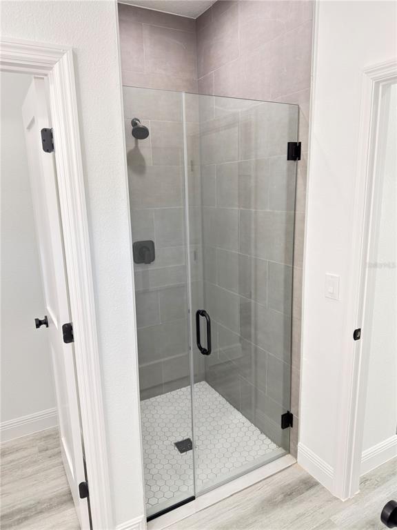 2703 Southwest 162nd Street Road Ocala, FL 34473 - Photo 17 of 39 a bathroom with a shower