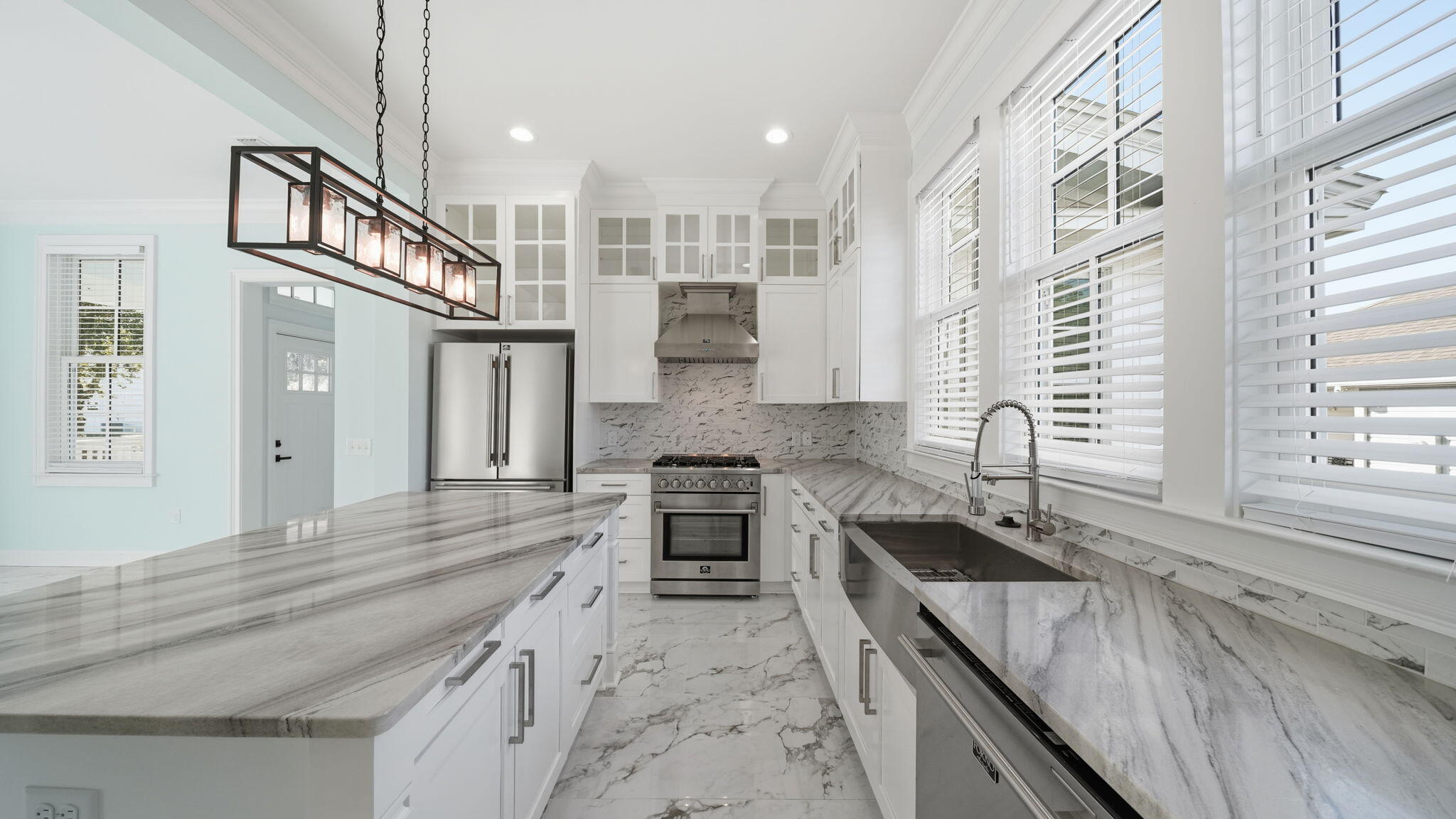 165 Staggerbush Street Freeport, FL 32439 - Photo 20 of 68 a kitchen with a sink stove and cabinets