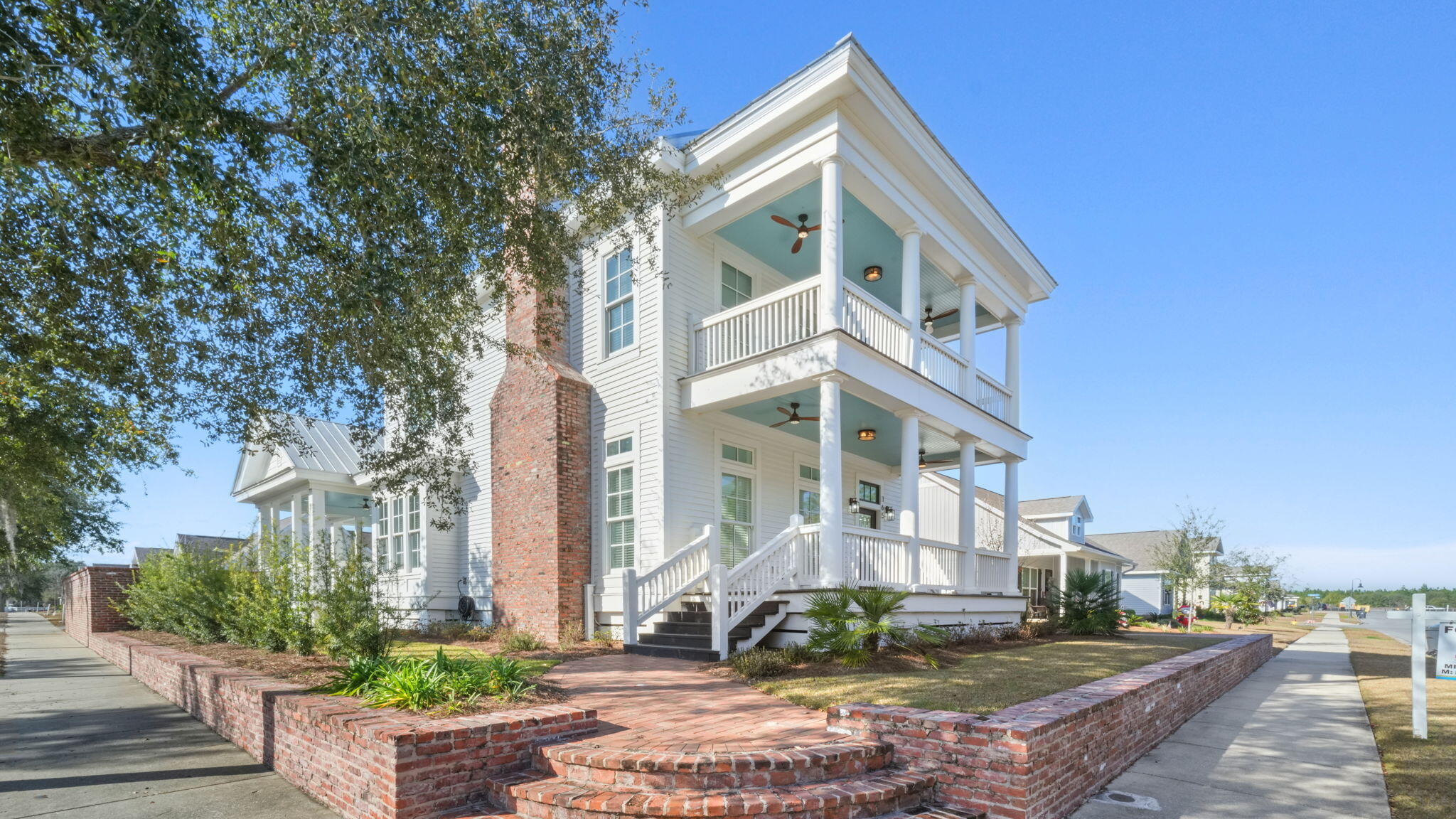 165 Staggerbush Street Freeport, FL 32439 - Photo 2 of 68 a front view of a house with a yard