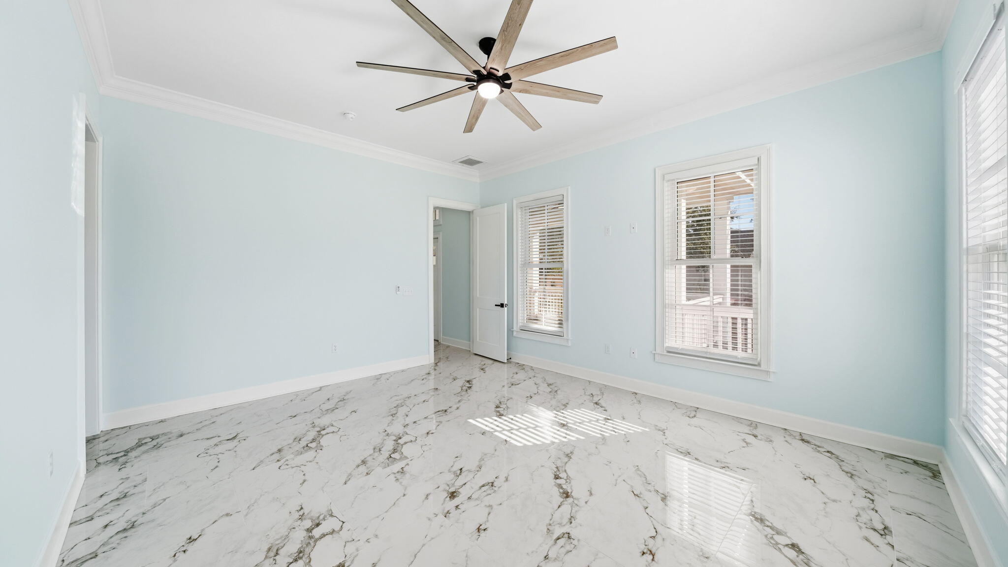 165 Staggerbush Street Freeport, FL 32439 - Photo 23 of 68 an empty room with window and ceiling fan