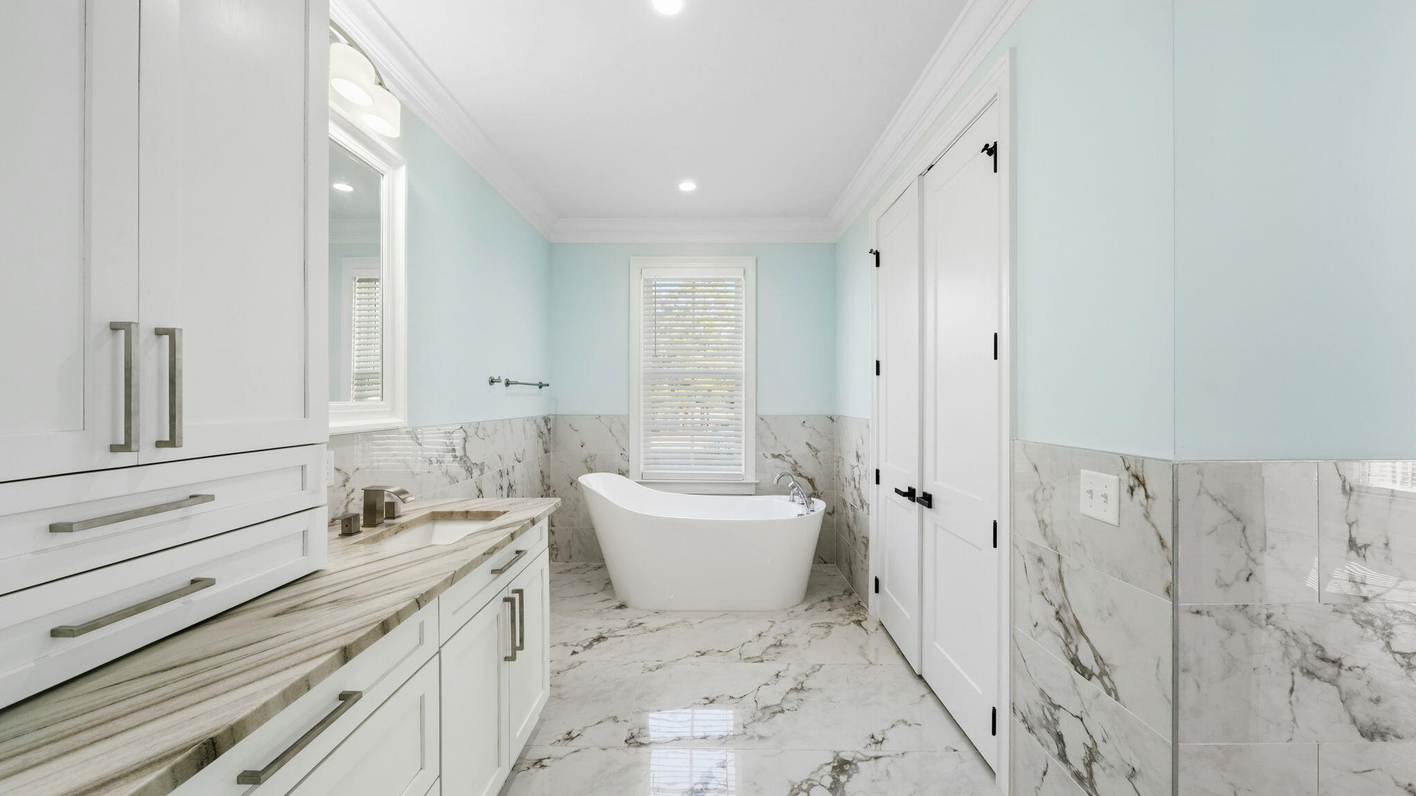 165 Staggerbush Street Freeport, FL 32439 - Photo 26 of 68 a bathroom with a sink toilet and shower