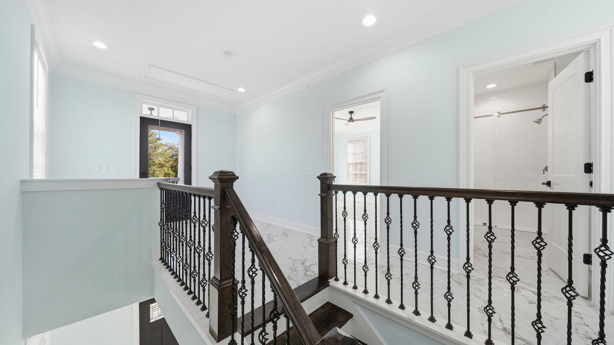 165 Staggerbush Street Freeport, FL 32439 - Photo 34 of 68 a view of a hallway with wooden stairs and stairs