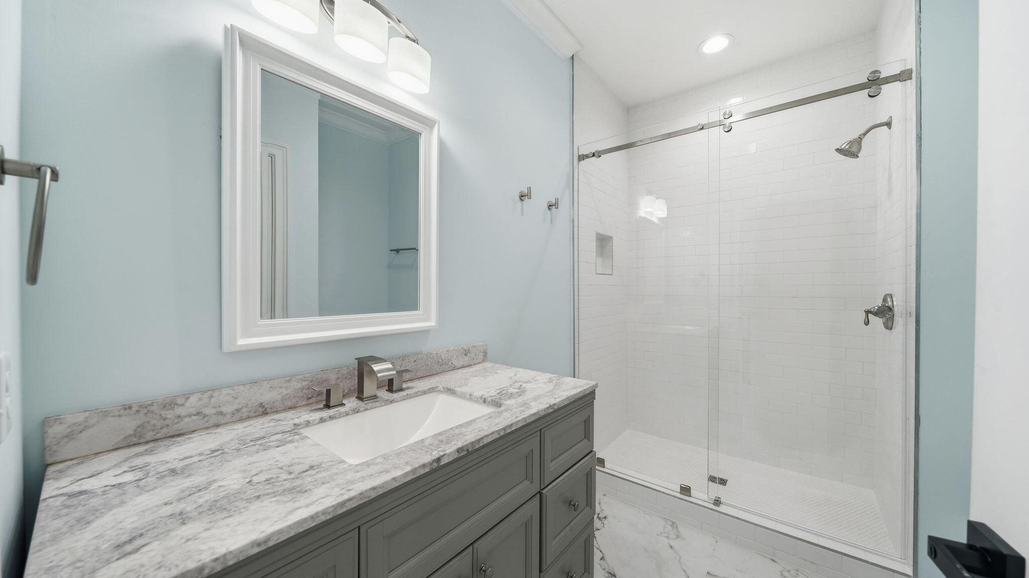 165 Staggerbush Street Freeport, FL 32439 - Photo 37 of 68 a bathroom with a granite countertop sink mirror and double