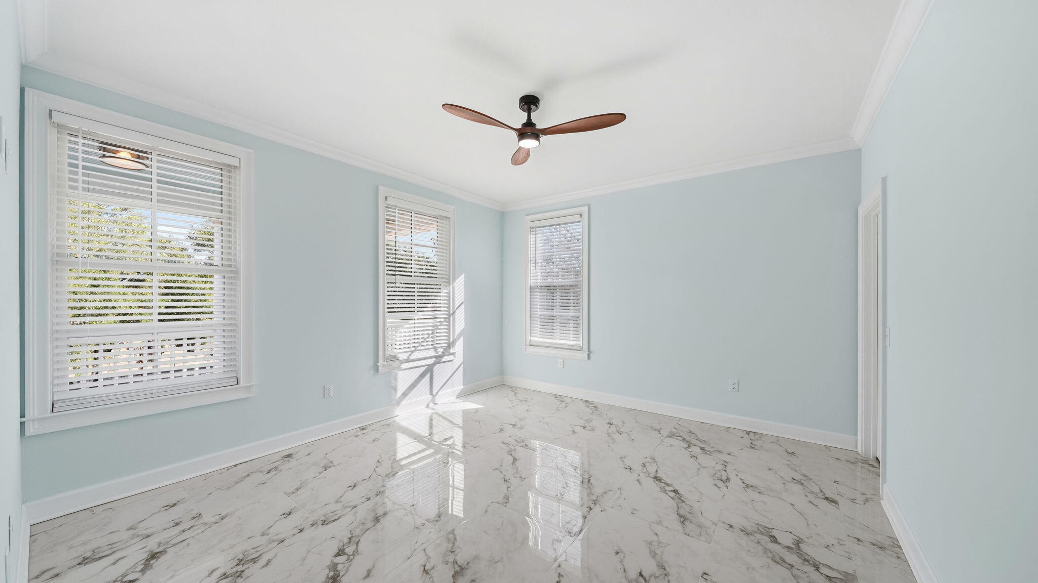 165 Staggerbush Street Freeport, FL 32439 - Photo 40 of 68 a view of a livingroom with a window and wooden floor