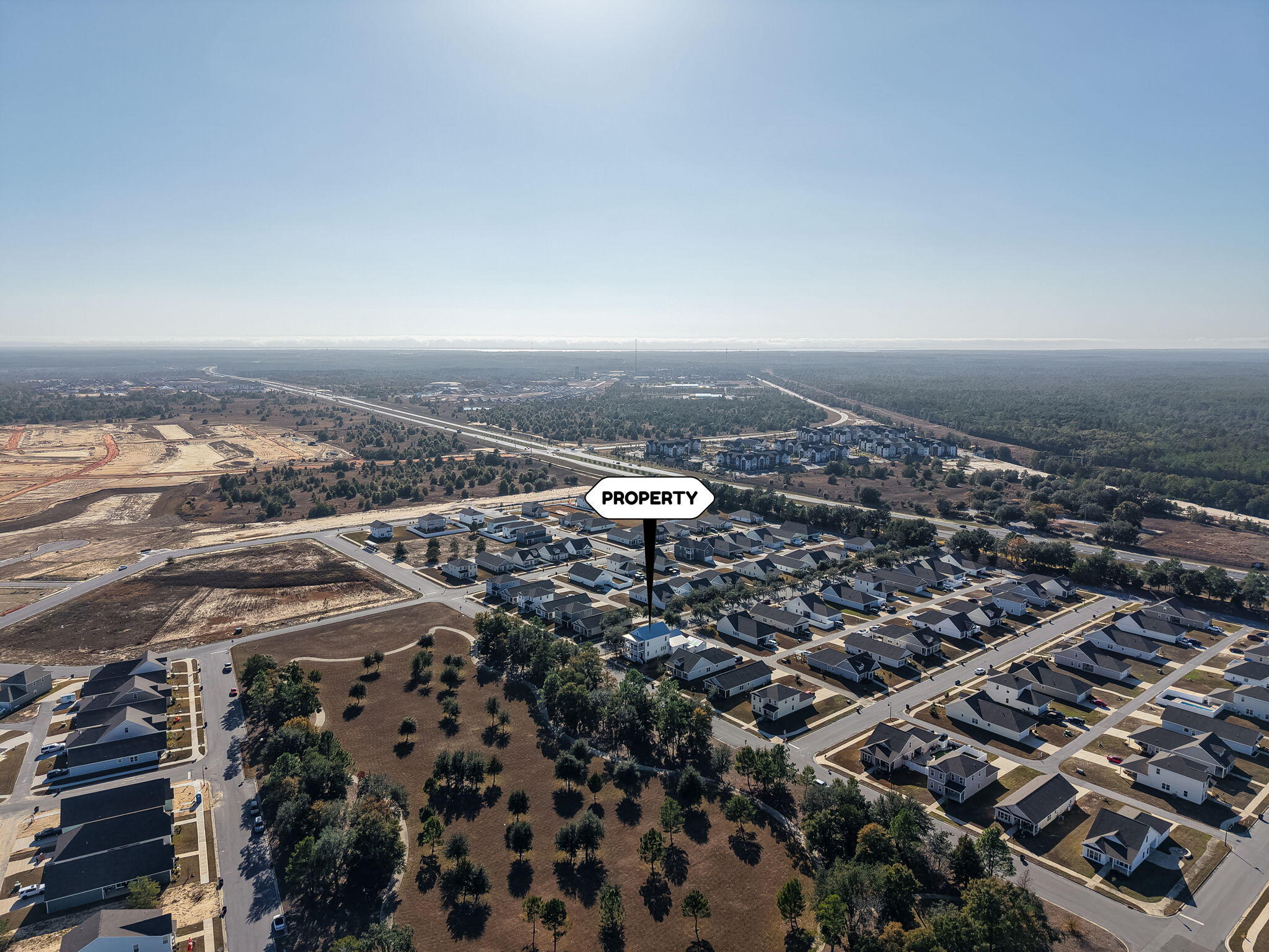 165 Staggerbush Street Freeport, FL 32439 - Photo 46 of 68 an aerial view of a city