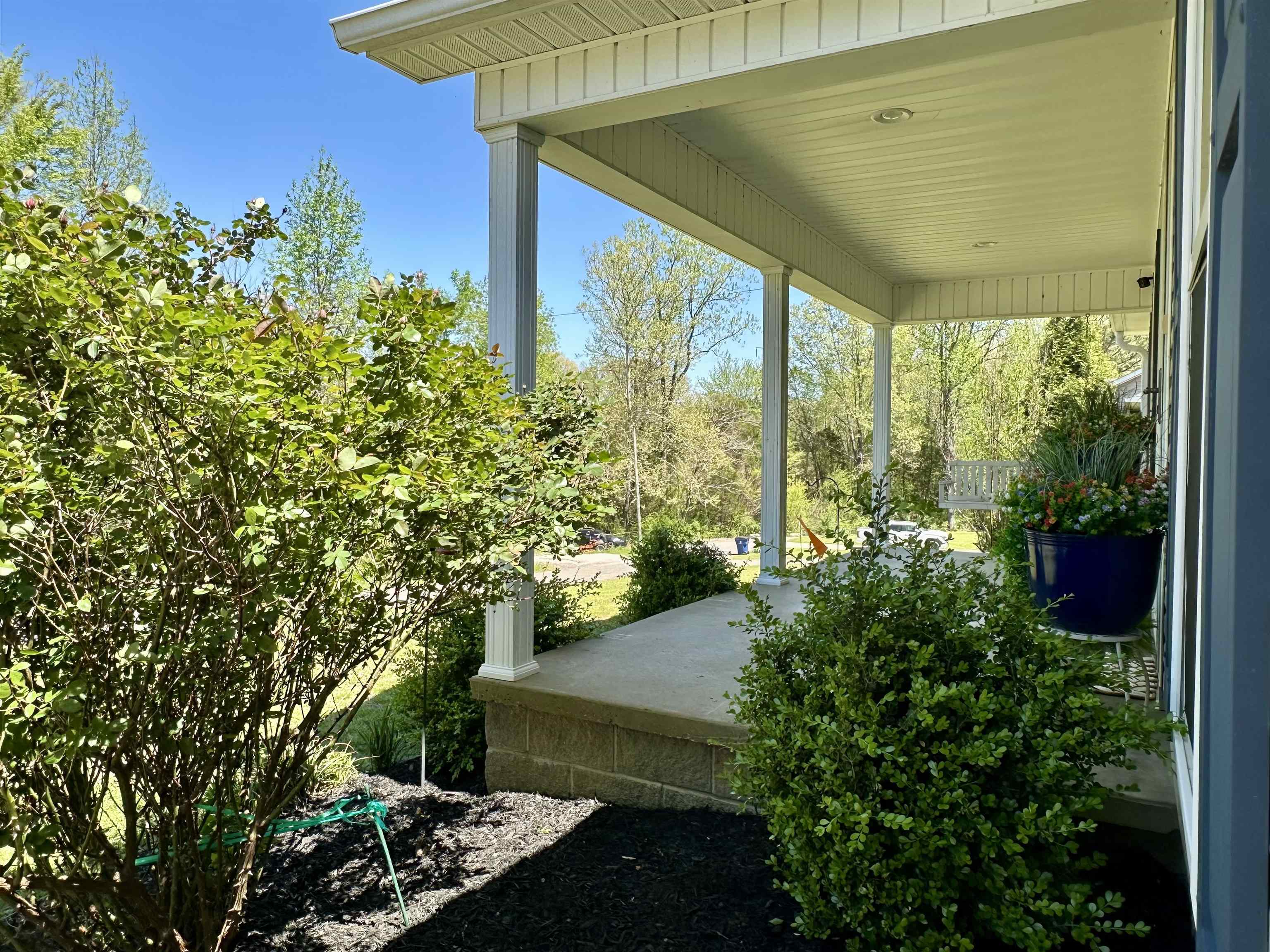 228 Edgewood Drive Adamsville, TN 38310 - Photo 27 of 37 View of patio / terrace with a porch