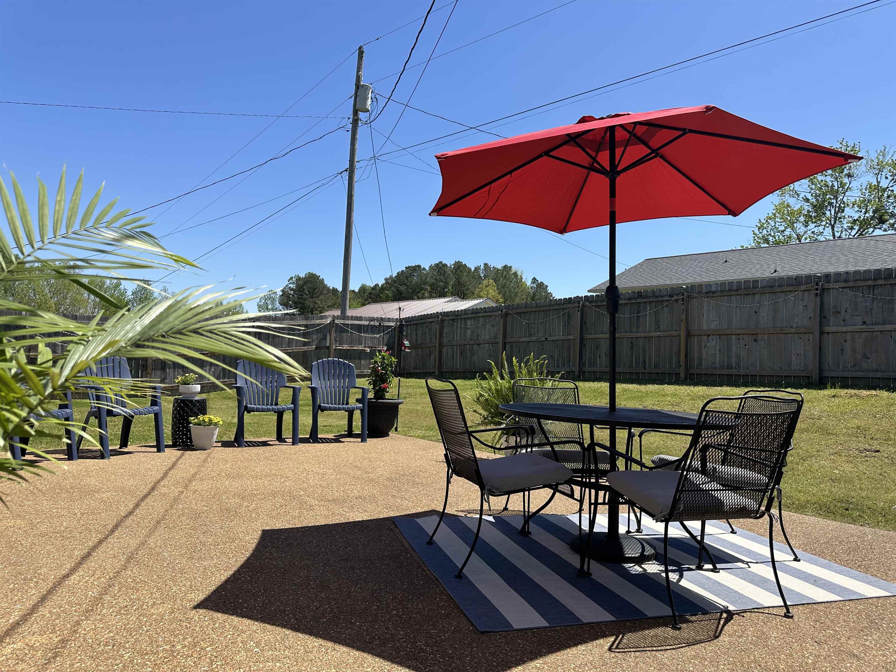 228 Edgewood Drive Adamsville, TN 38310 - Photo 33 of 37 View of patio / terrace with a fenced backyard and outdoor dining area