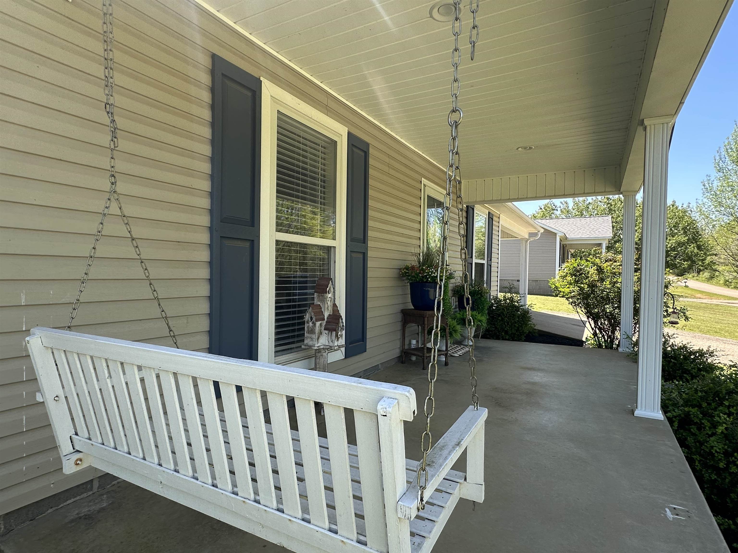 228 Edgewood Drive Adamsville, TN 38310 - Photo 36 of 37 View of patio with covered porch
