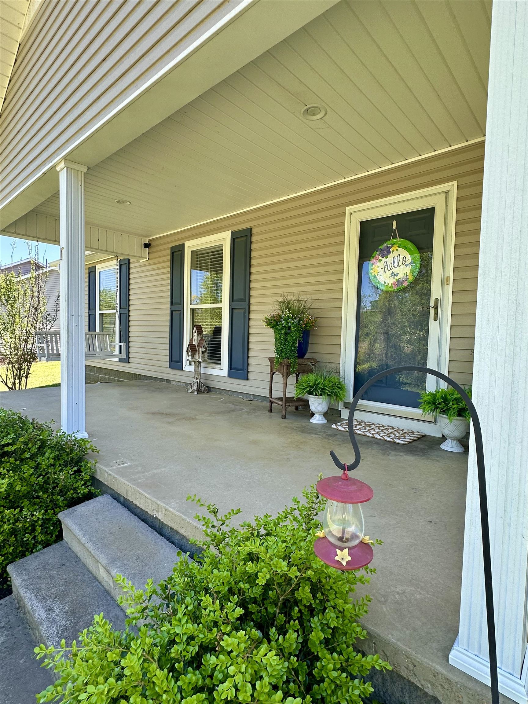 228 Edgewood Drive Adamsville, TN 38310 - Photo 5 of 37 View of patio / terrace with covered porch
