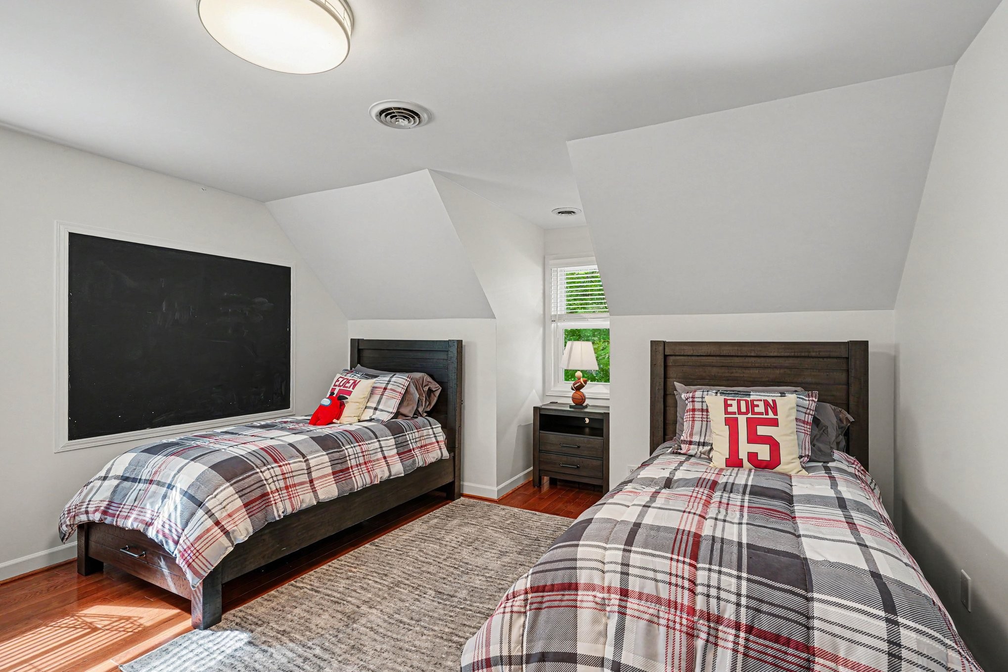 5833 Highway 76 East Springfield, TN 37172 - Photo 28 of 66 a bedroom with a bed and a flat screen tv
