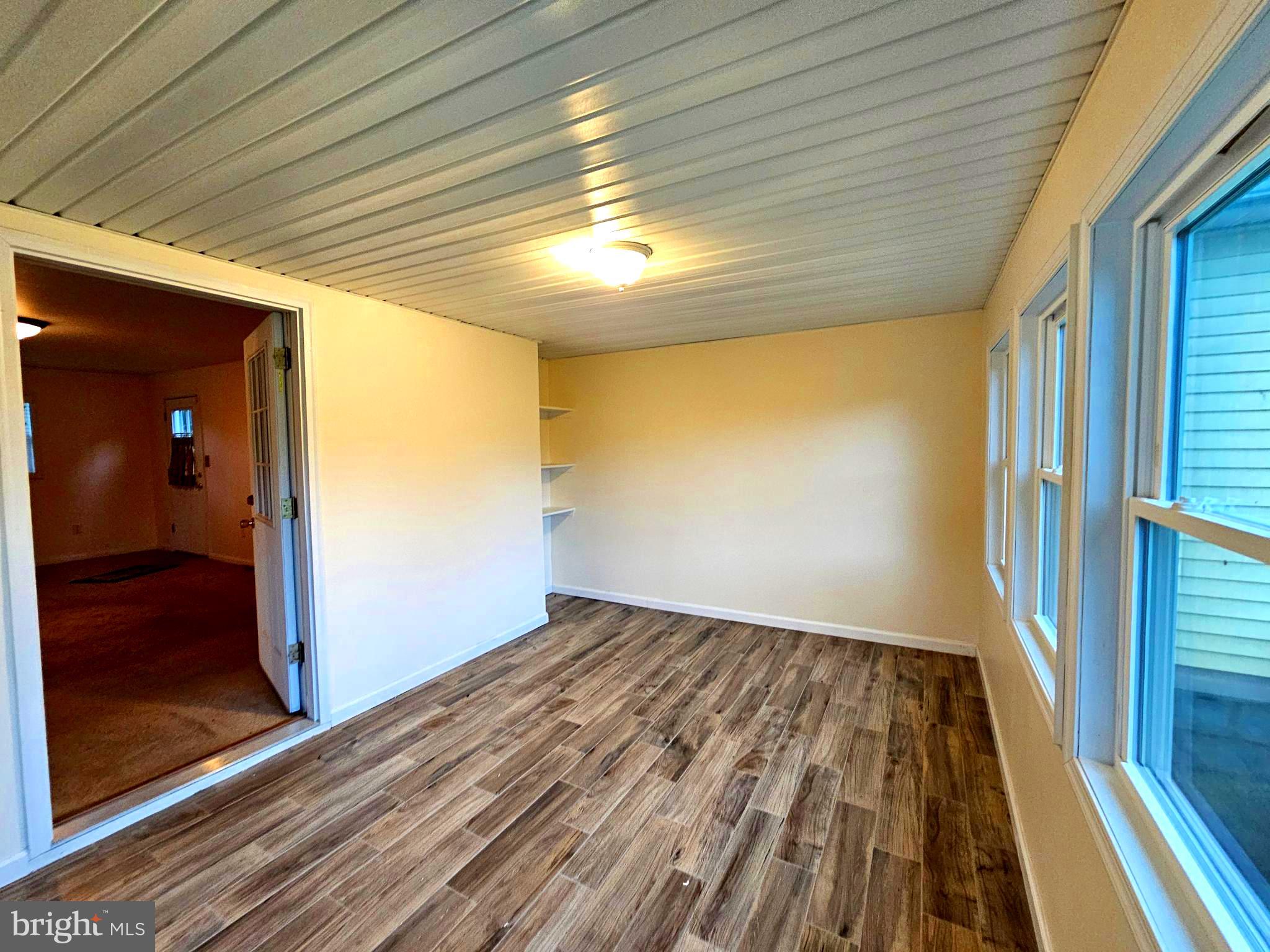310 Bethel Road Paw Paw, WV 25434 - Photo 11 of 30 a view of hallway with wooden floor