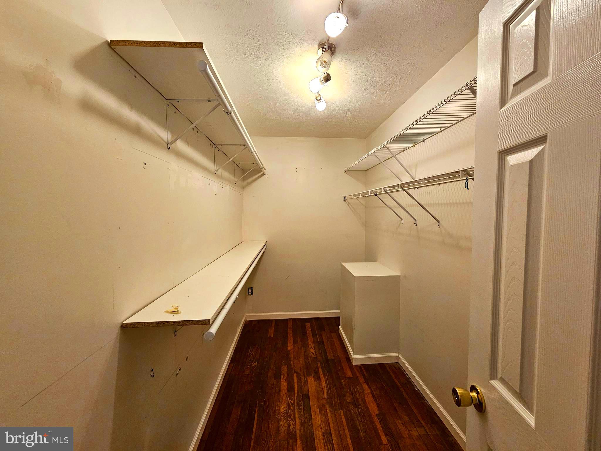 310 Bethel Road Paw Paw, WV 25434 - Photo 15 of 30 a view of a hallway with wooden floor and staircase