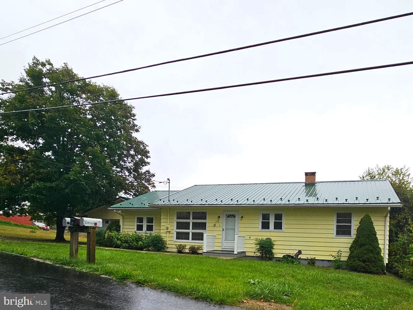 310 Bethel Road Paw Paw, WV 25434 - Photo 28 of 30 a view of a house with a outdoor space