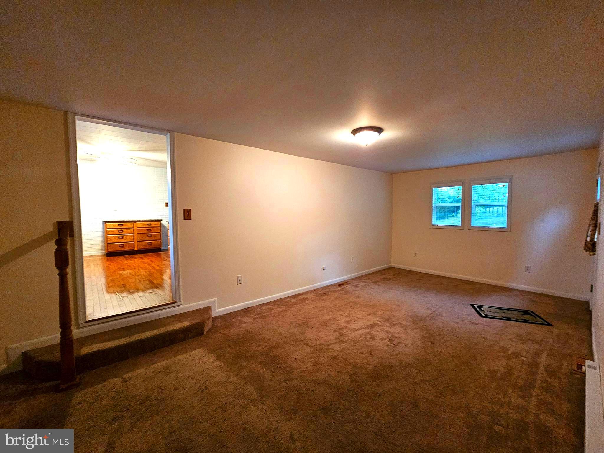 310 Bethel Road Paw Paw, WV 25434 - Photo 9 of 30 an empty room with windows