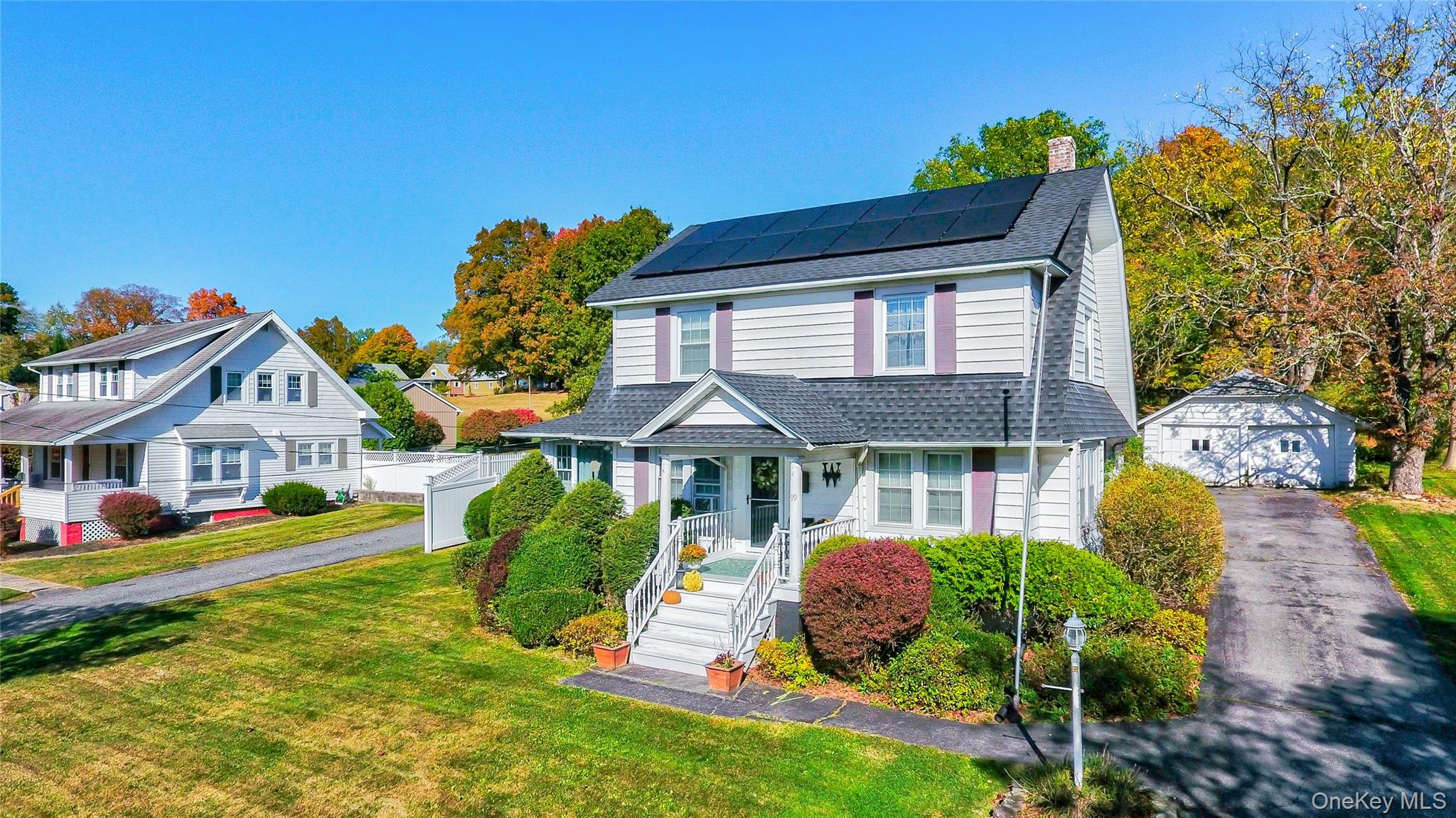 99 South Main Street Florida, NY 10921 - Photo 1 of 35 a front view of a house with garden