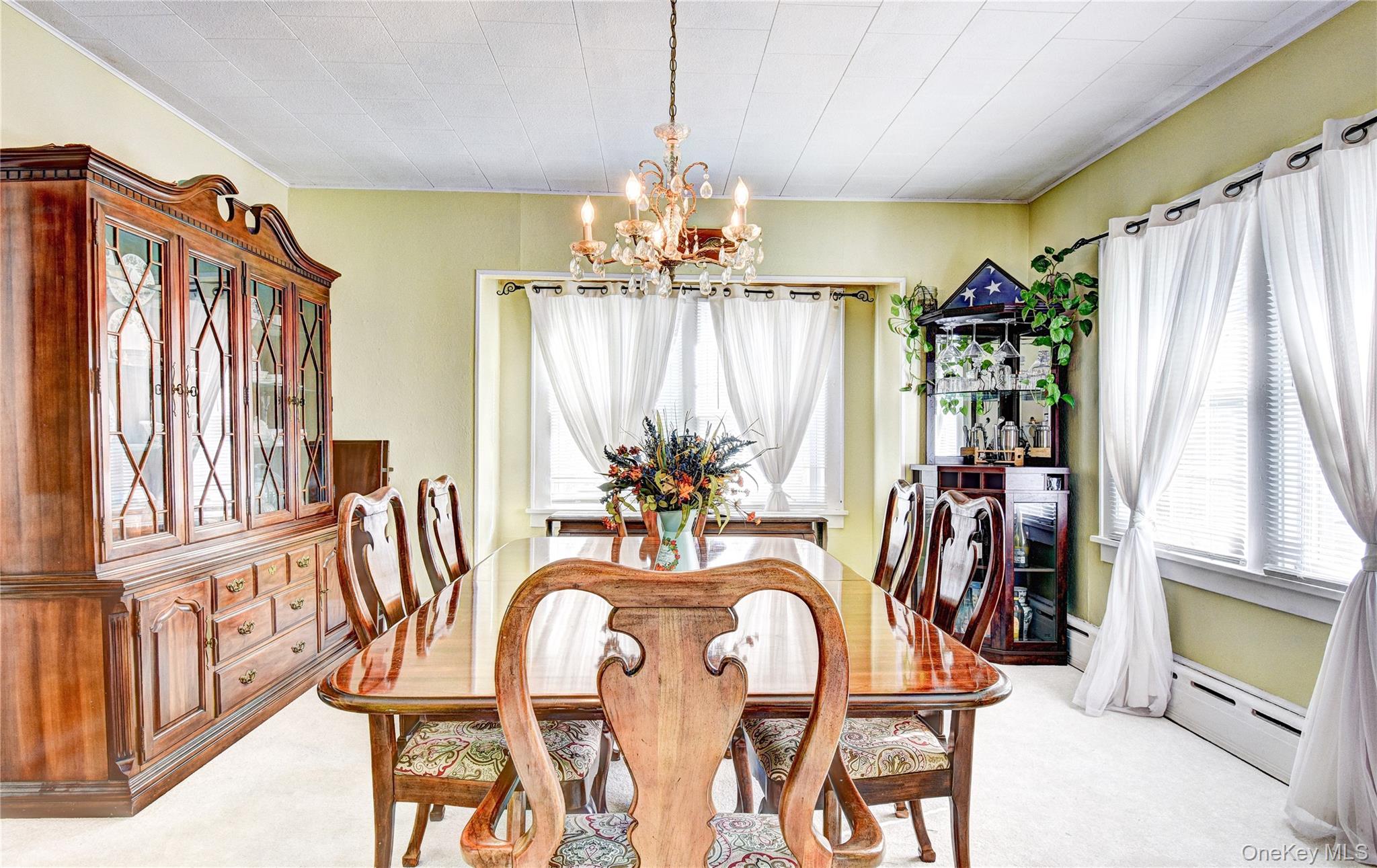 99 South Main Street Florida, NY 10921 - Photo 5 of 35 a view of a dining room with furniture window and chandelier