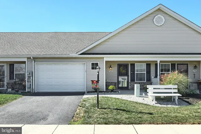 a house view with a garden space