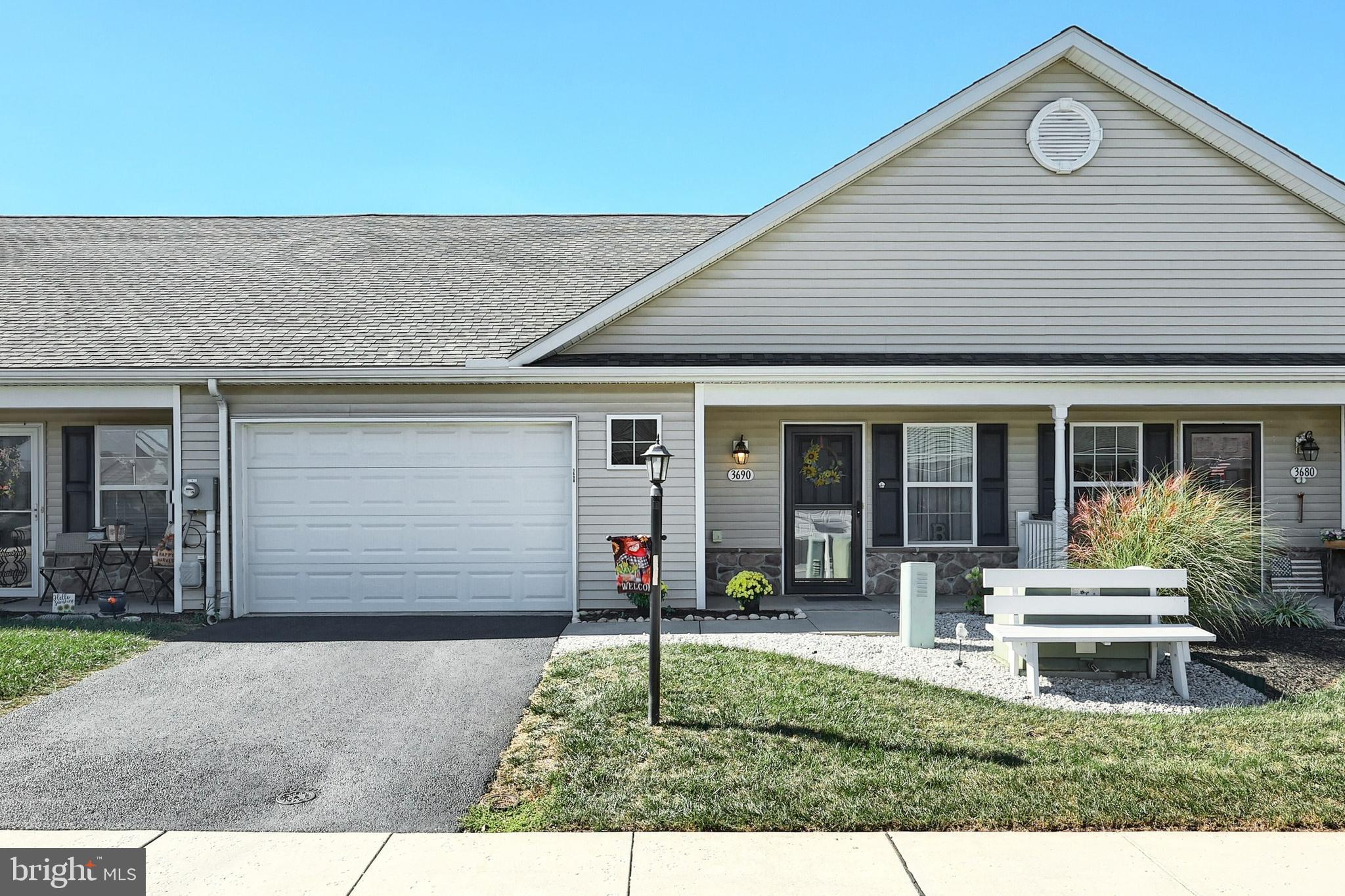 a house view with a garden space