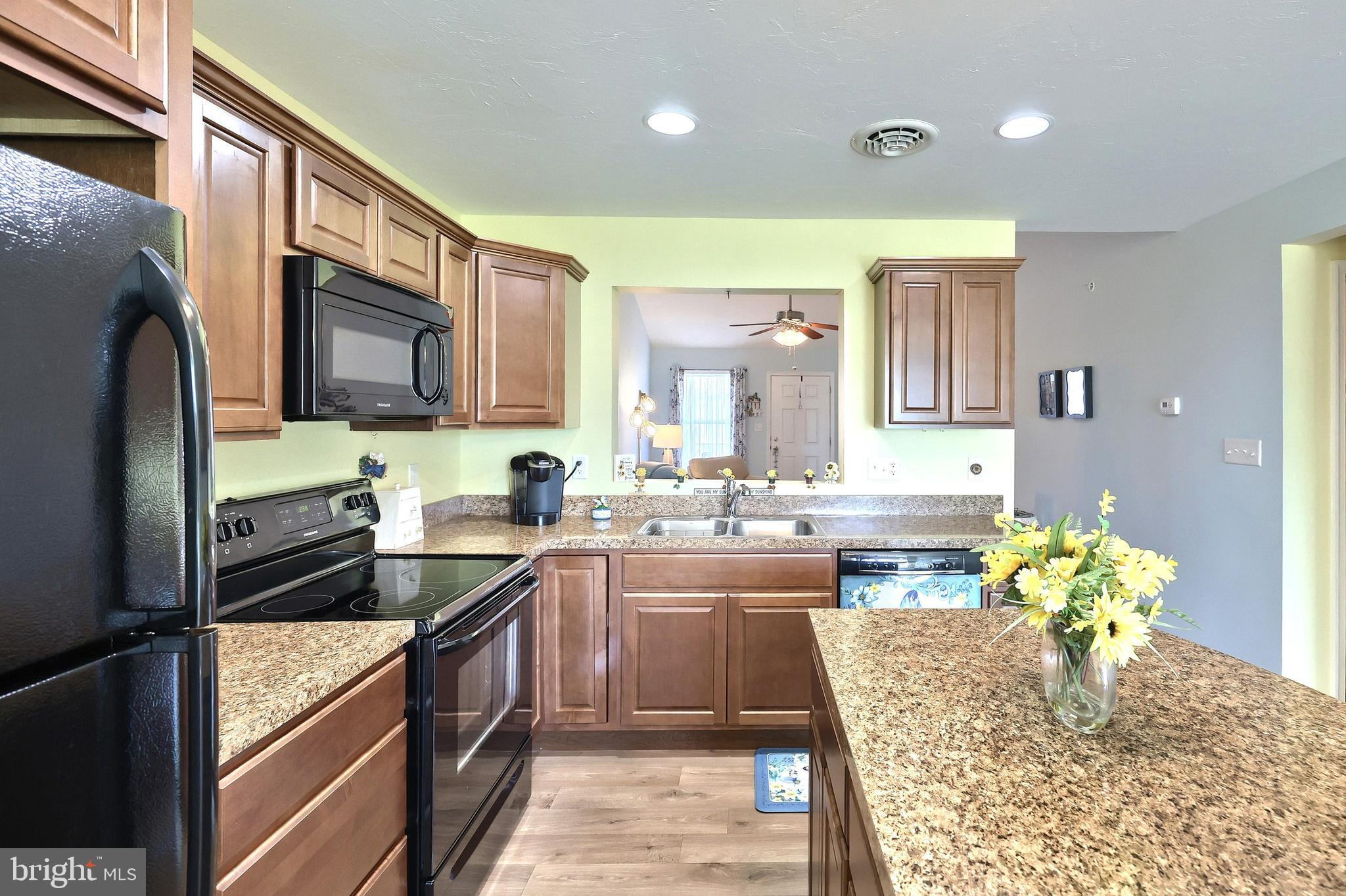 3690 Rye Court, Unit 2 Dover, PA 17315 - Photo 18 of 32 a kitchen with cabinets and stainless steel appliances