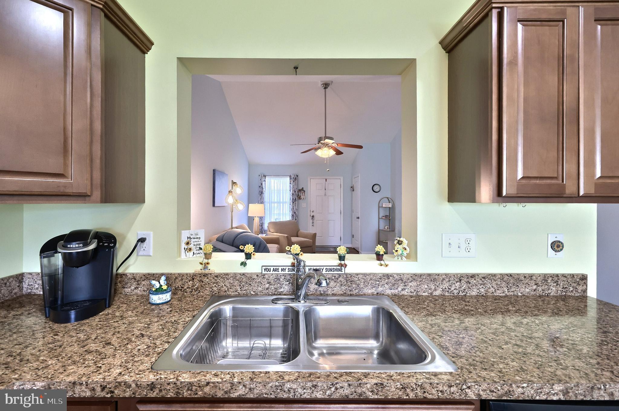 3690 Rye Court, Unit 2 Dover, PA 17315 - Photo 19 of 32 a kitchen with a sink a faucet and cabinets