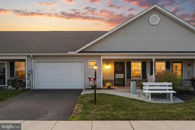 a view of a house with backyard porch and patio