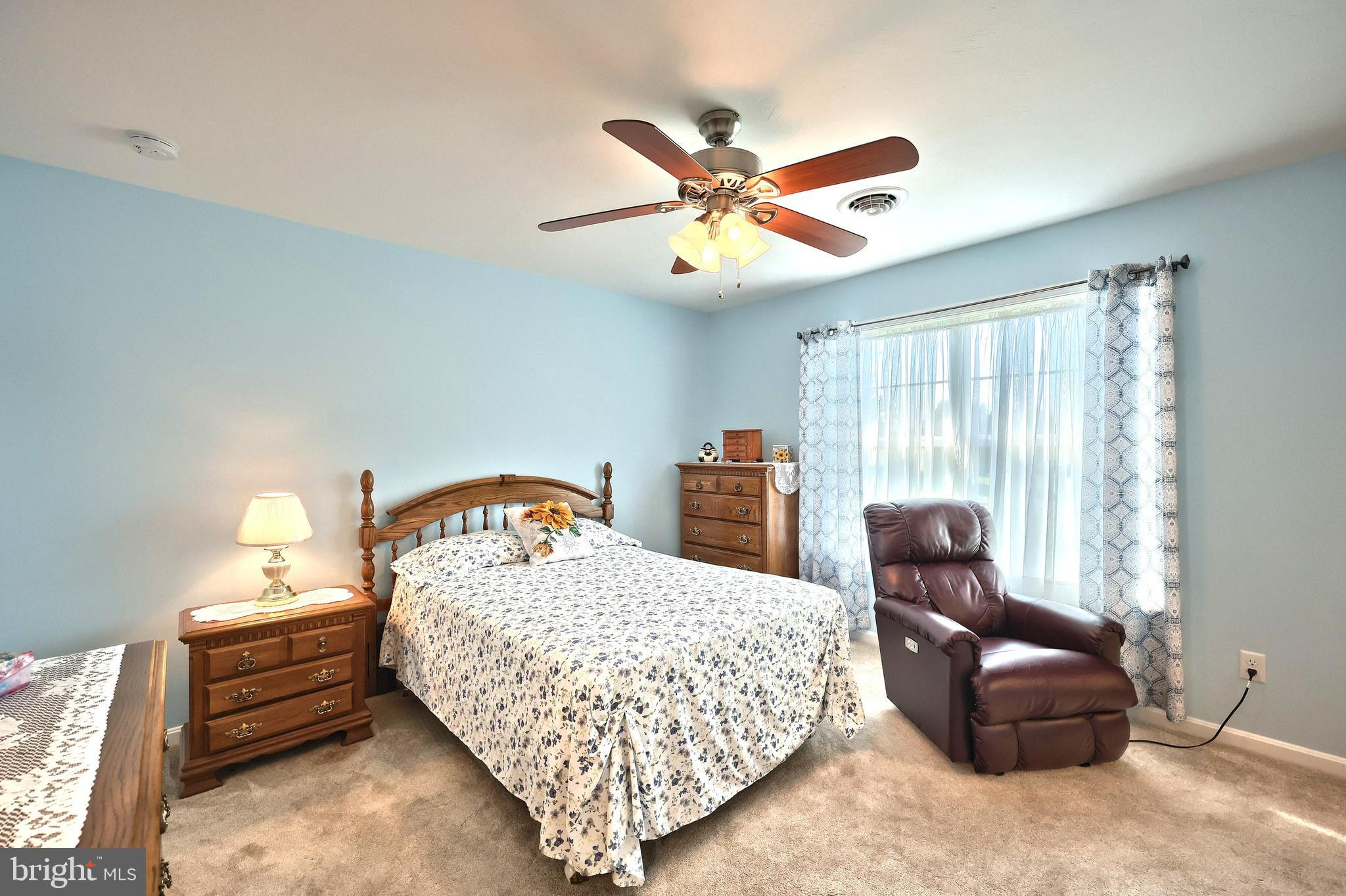 3690 Rye Court, Unit 2 Dover, PA 17315 - Photo 27 of 32 a bedroom with a bed and window