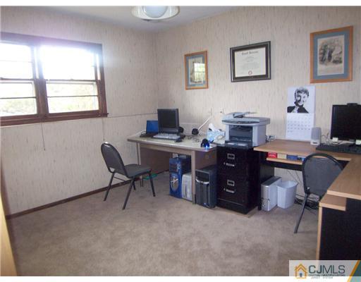 66 East Cliff Road Colonia, NJ 07067 - Photo 11 of 18 a view of a workspace with a window