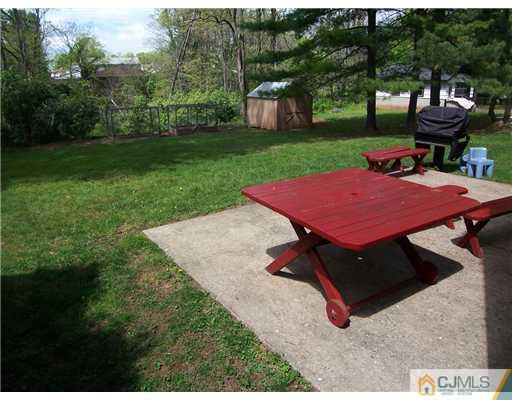 66 East Cliff Road Colonia, NJ 07067 - Photo 18 of 18 a view of a backyard with sitting area
