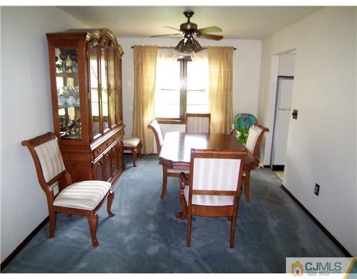 66 East Cliff Road Colonia, NJ 07067 - Photo 5 of 18 a living room with furniture and a window