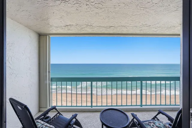 a view of a living room and a window