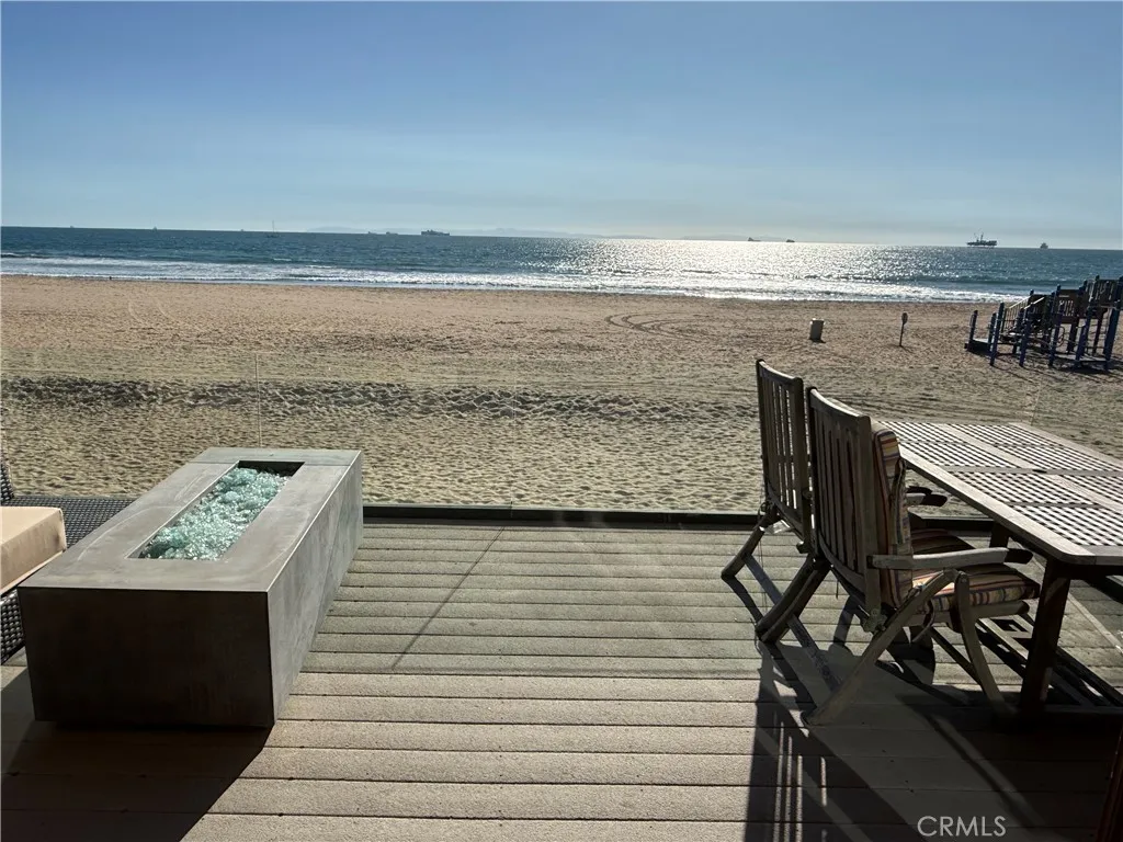 87 Surfside Avenue Surfside, CA 90743 - Photo 3 of 14 a view of an ocean from a balcony