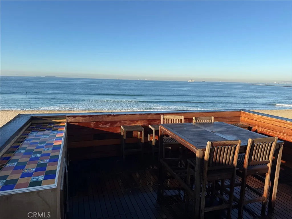 87 Surfside Avenue Surfside, CA 90743 - Photo 4 of 14 a view of balcony and wooden floor