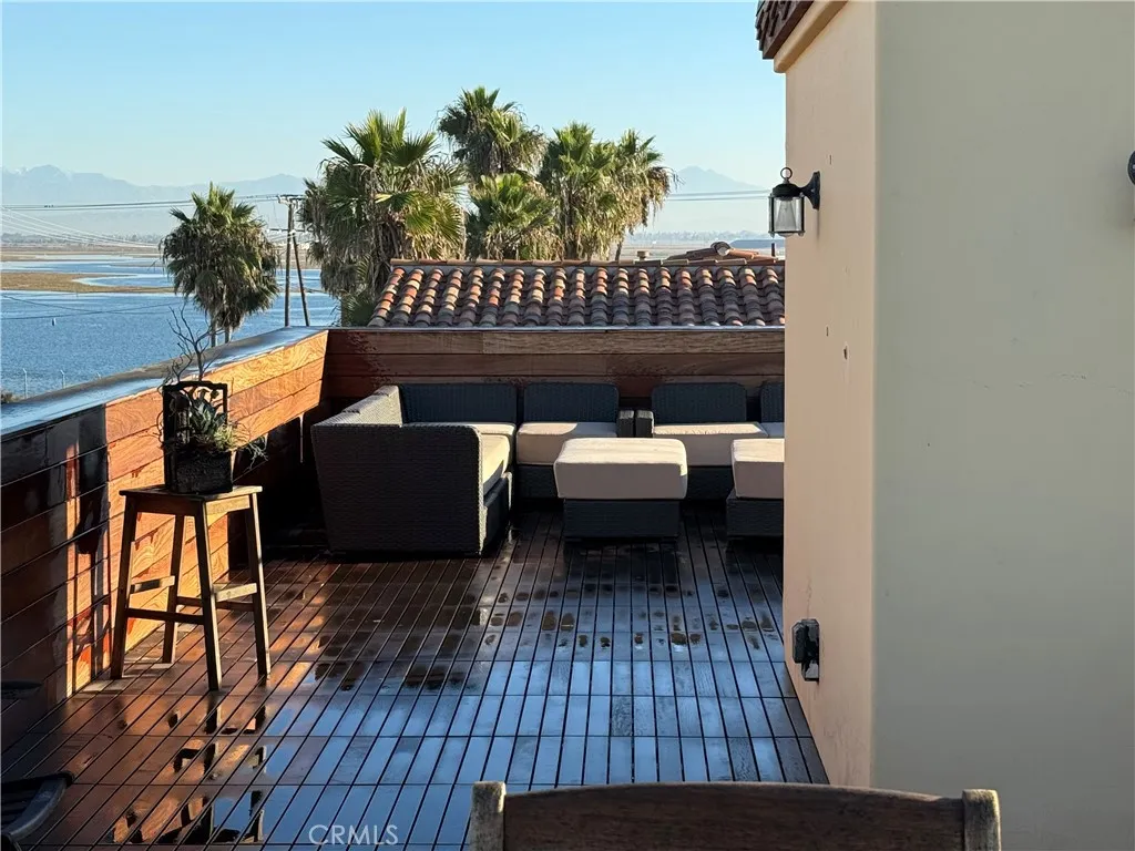 87 Surfside Avenue Surfside, CA 90743 - Photo 8 of 14 a view of a balcony with furniture