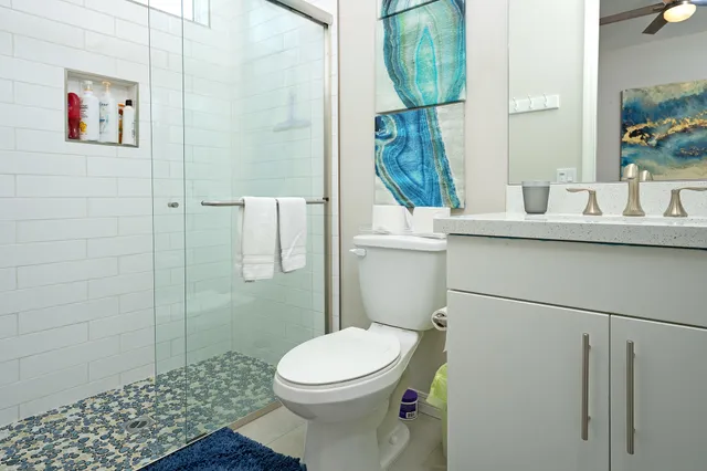 a bathroom with a toilet and a sink