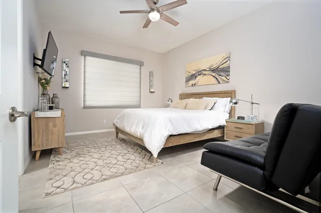 a bedroom with a bed and furniture