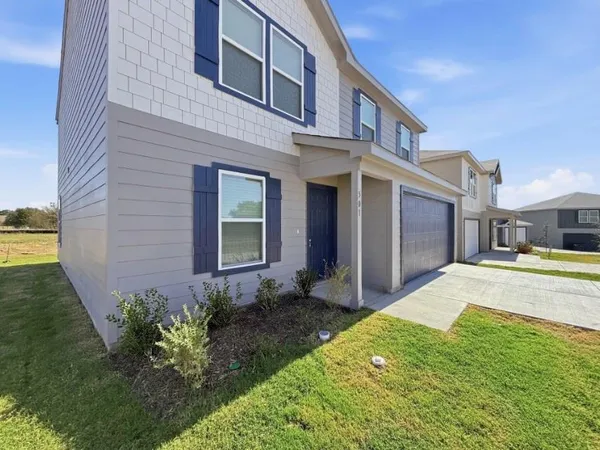 a view of swimming pool with a yard