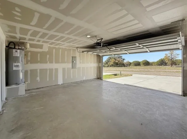 a view of a ocean with a building in the background