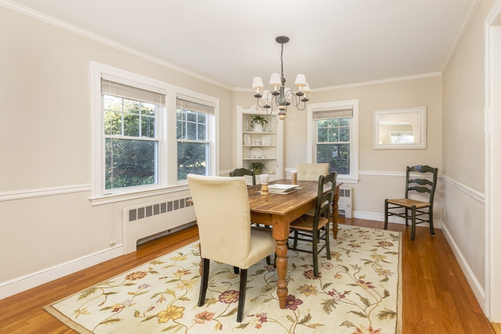 27 Preston Beach Road Marblehead, MA 01945 - Photo 8 of 32 a view of a dining room with furniture window and wooden floor