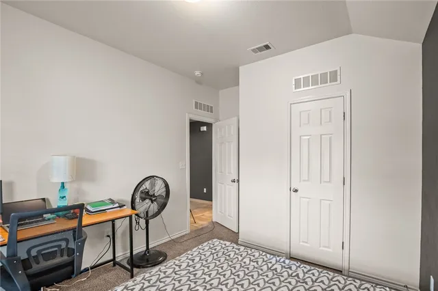 a view of a livingroom with furniture