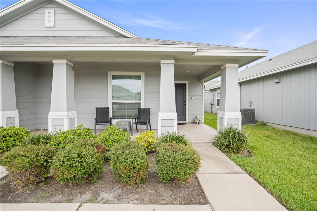 6718 Breeann Street Corpus Christi, TX 78413 - Photo 3 of 22 a view of a house with a yard