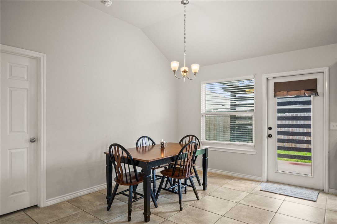 6718 Breeann Street Corpus Christi, TX 78413 - Photo 10 of 22 a view of a dining room with furniture window and outside view