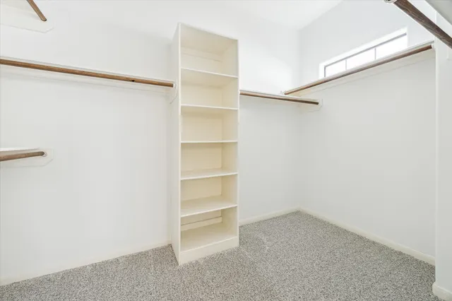 a view of an empty walk in closet