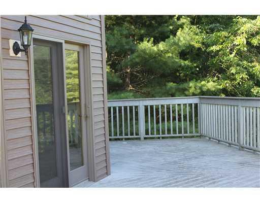 61 Falls Road Benton, ME 04901 - Photo 3 of 23 Exterior Front. Wraparound deck to...