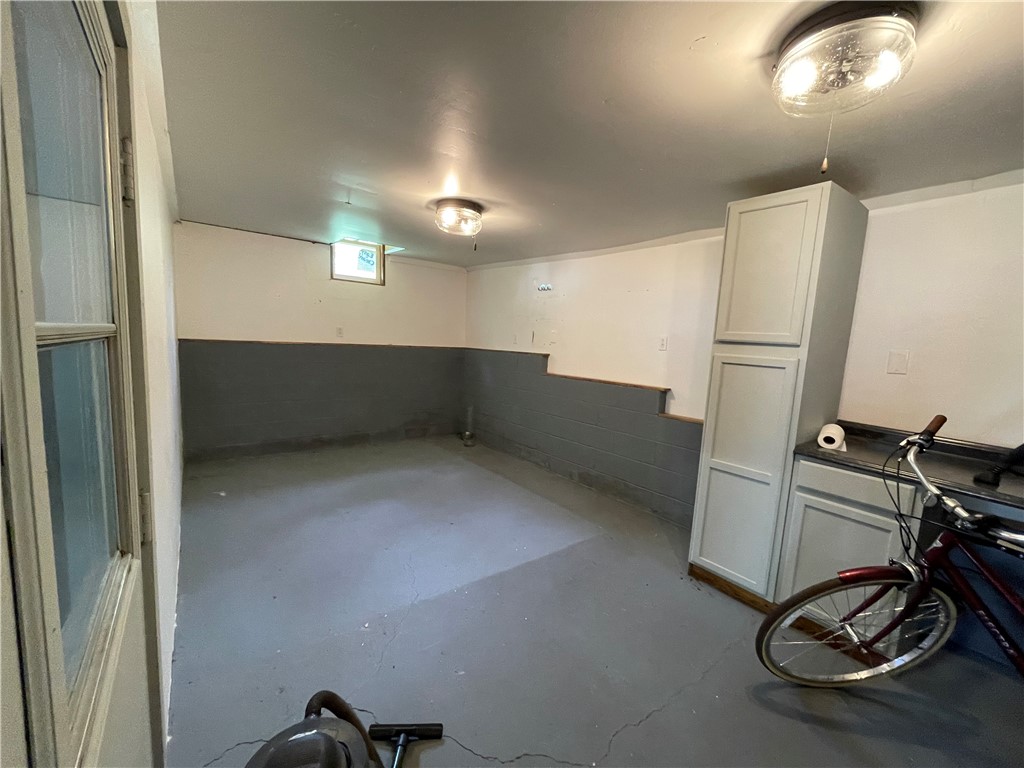 360 Ridge Street Piqua, OH 45356 - Photo 38 of 46 This spacious basement offers a versatile area for various uses.