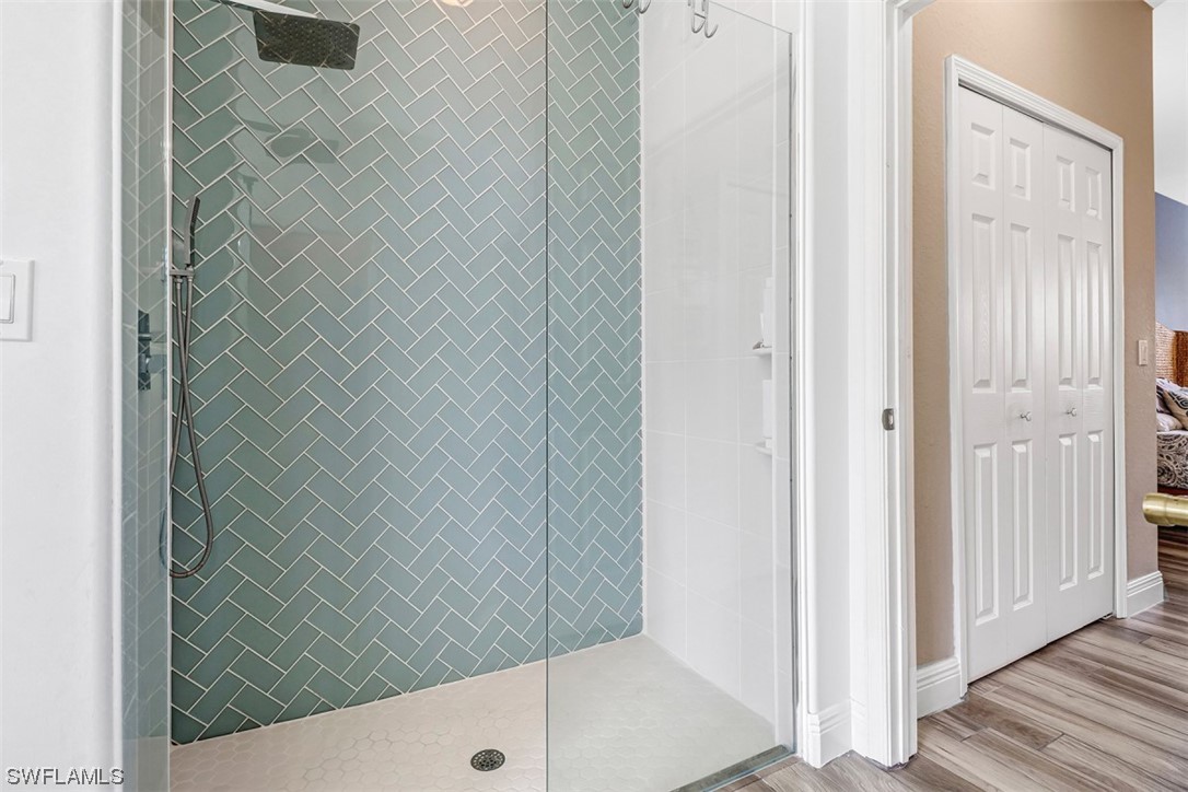 3944 Ruxton Road Naples, FL 34116 - Photo 19 of 23 a bathroom with a shower