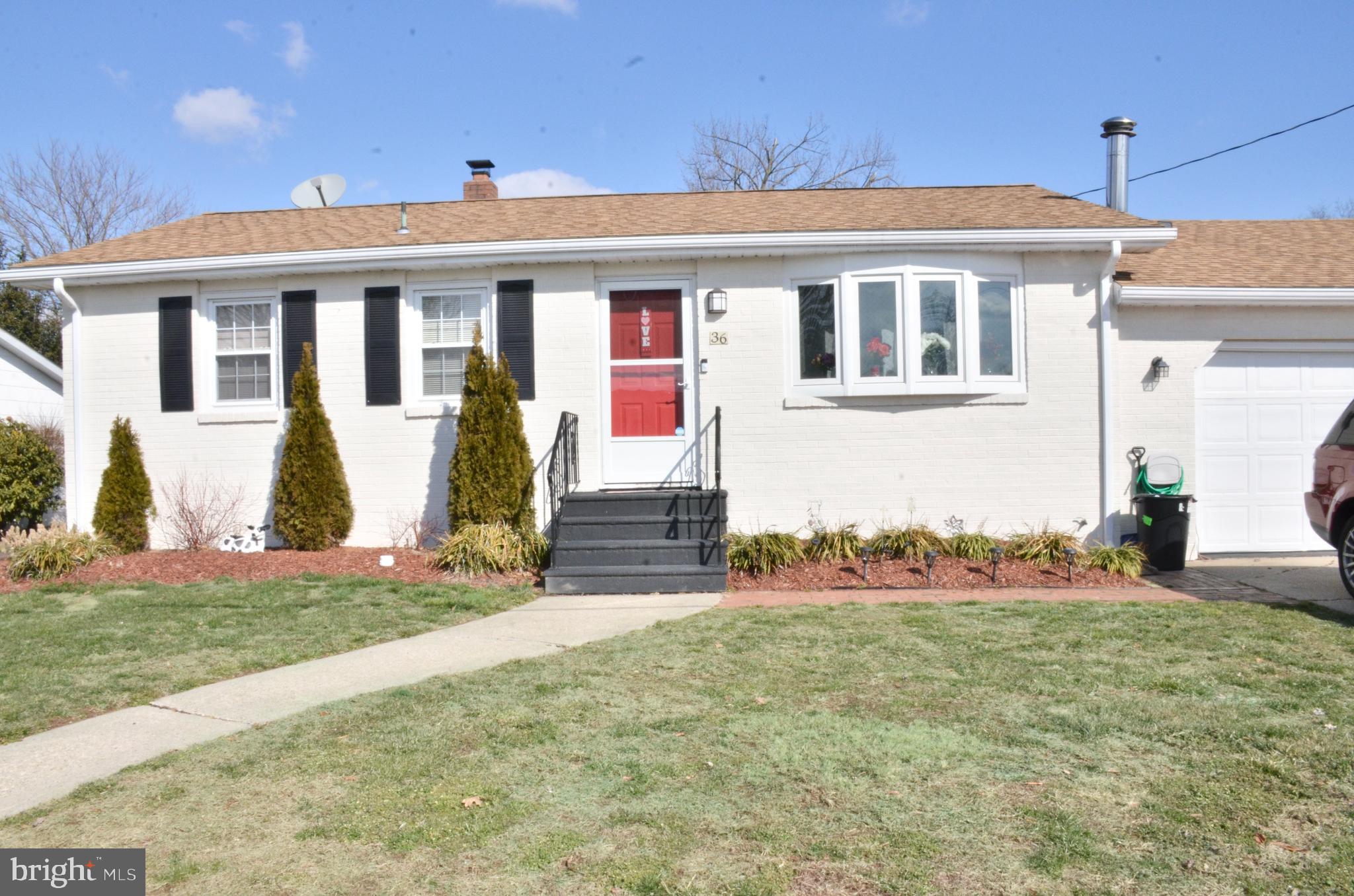 36 Harvard Road Pennsville, NJ 08070 - Photo 27 of 31 a front view of house with yard
